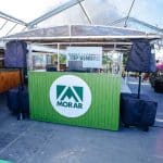 Registro do evento de premiação para corretores Top Vendas 2025.